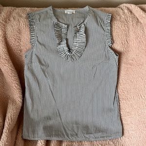 Pinstriped suit blouse in blue and white.